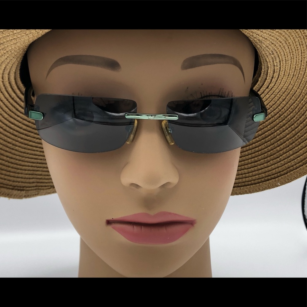 Dolce & Gabbana sunglasses with green lenses